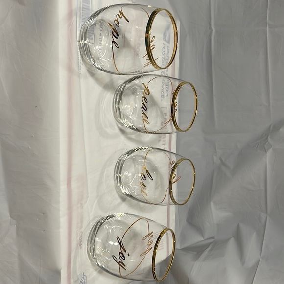 Nwot stemless wine glasses with gold letterin and gold writing 4.5” tall x 2.75” - Picture 1 of 5